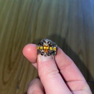 Elegant Silver and Yellow Gemstone Ring